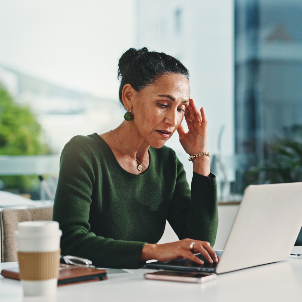 Woman looking worried about market pressure